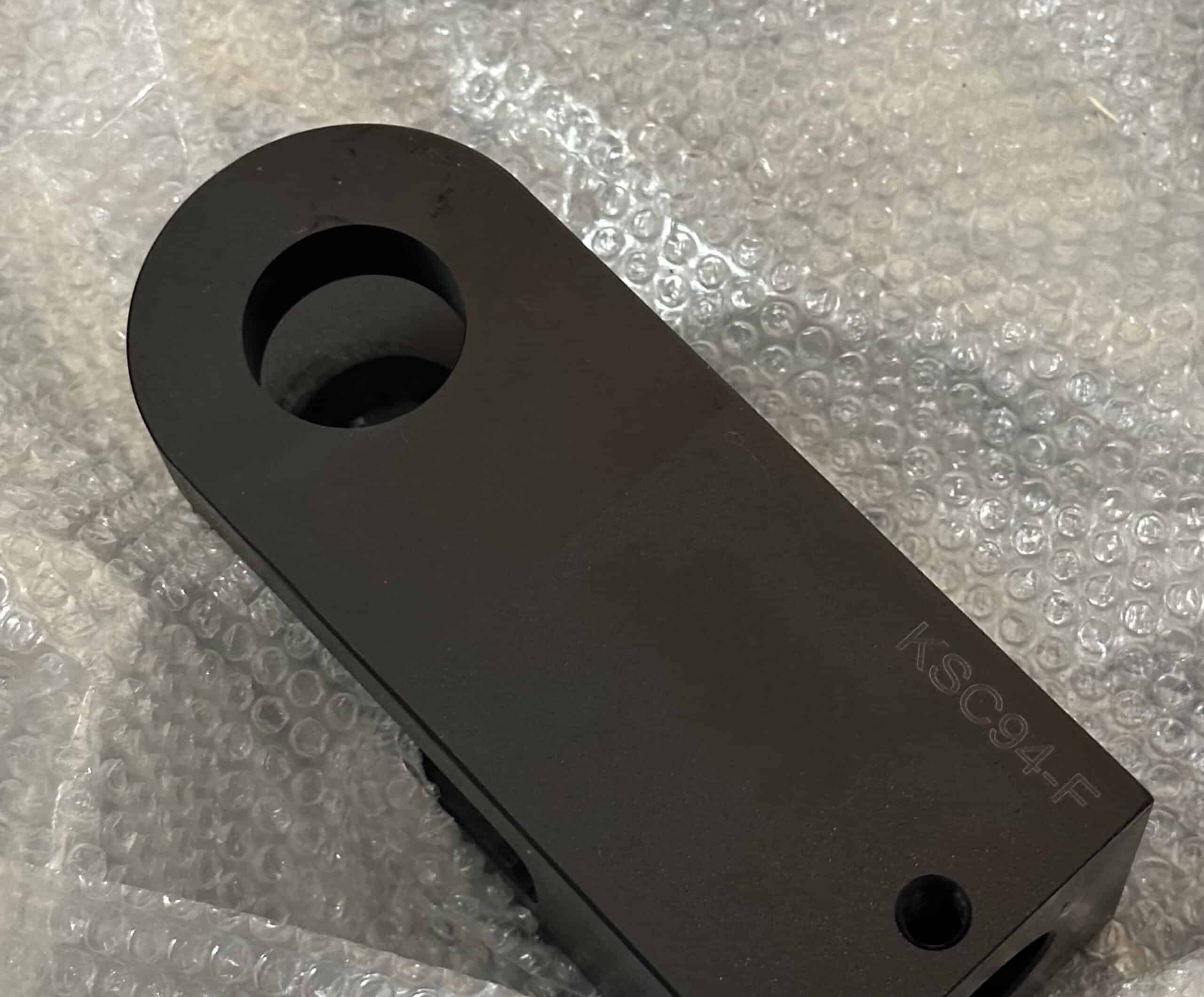 A laser-engraved CNC machined clevis for hydraulic cylinders